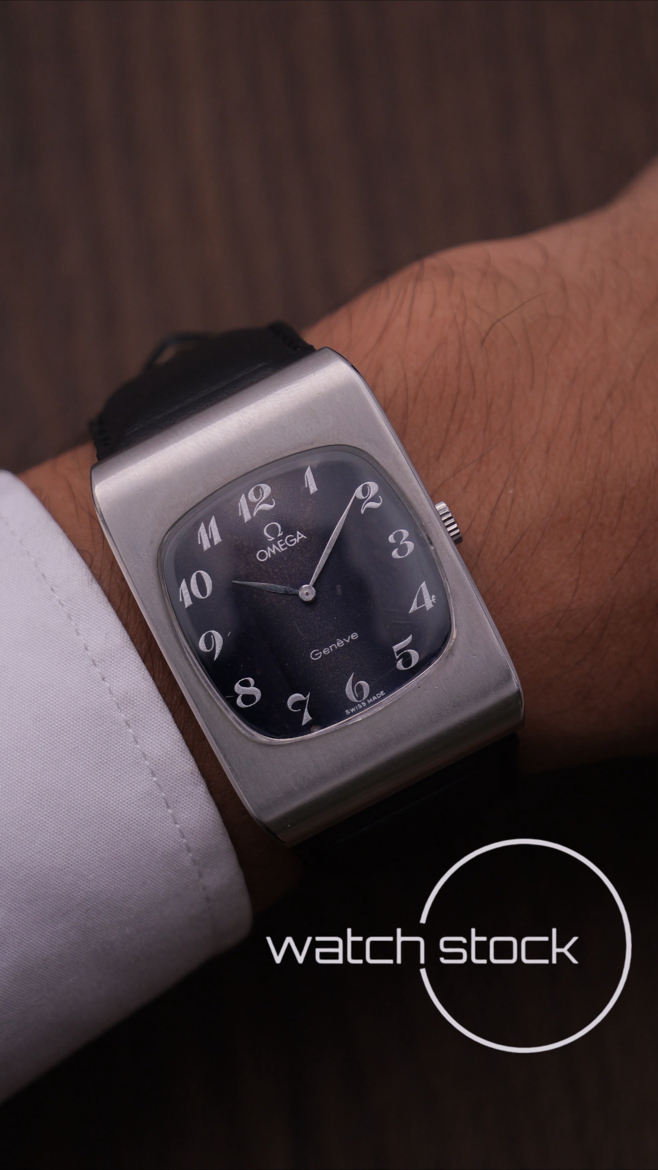 Omega Genève vintage meccanico vertical soleil dial